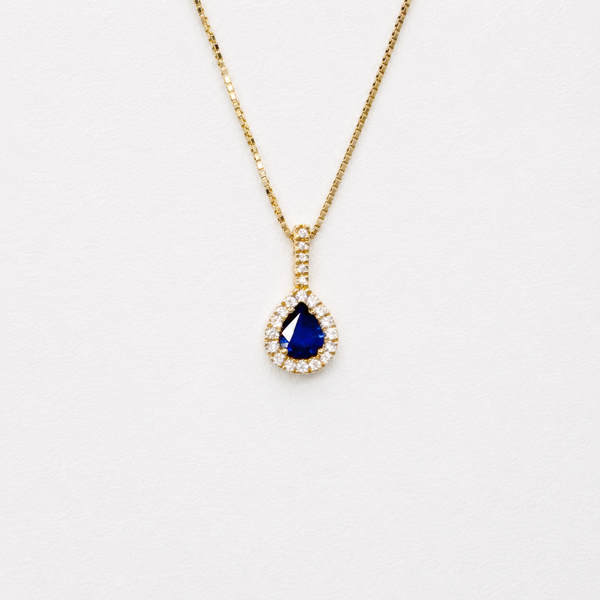 Pear shaped Sapphire pendant in yellow gold 