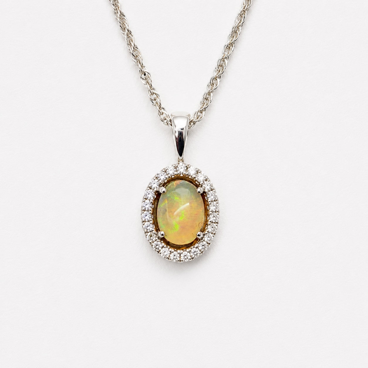 Genuine Ethiopian Opal And Diamond Halo Pendant|10KW