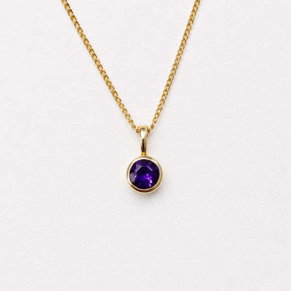 Bezel Set Round Faceted Amethyst Pendant in 14K Yellow Gold