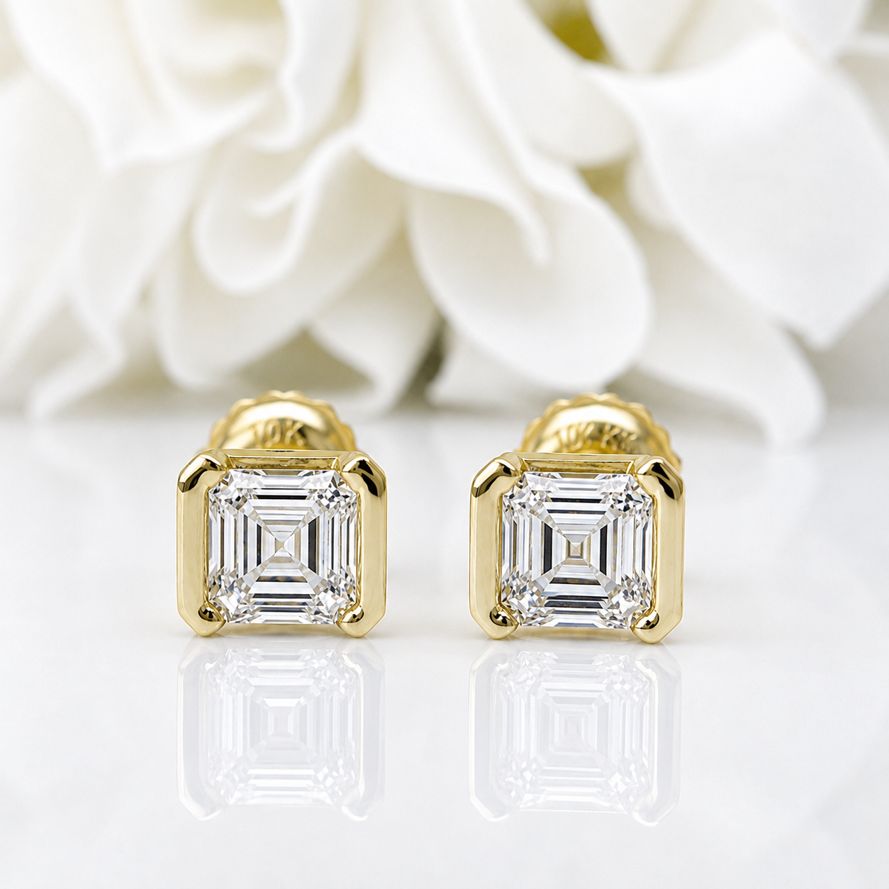 0.50 Total Carat Weight Half Bezel Emerald Cut Lab Grown Diamond Studs | 10K Yellow Gold