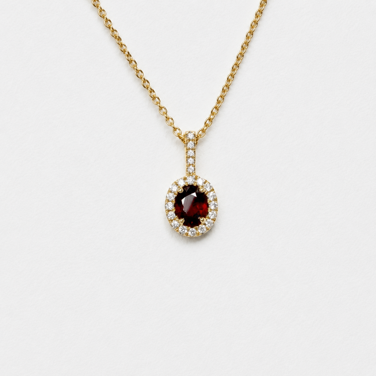 Natural Oval Cut Ruby & Diamond Halo Pendant | 14K Yellow Gold
