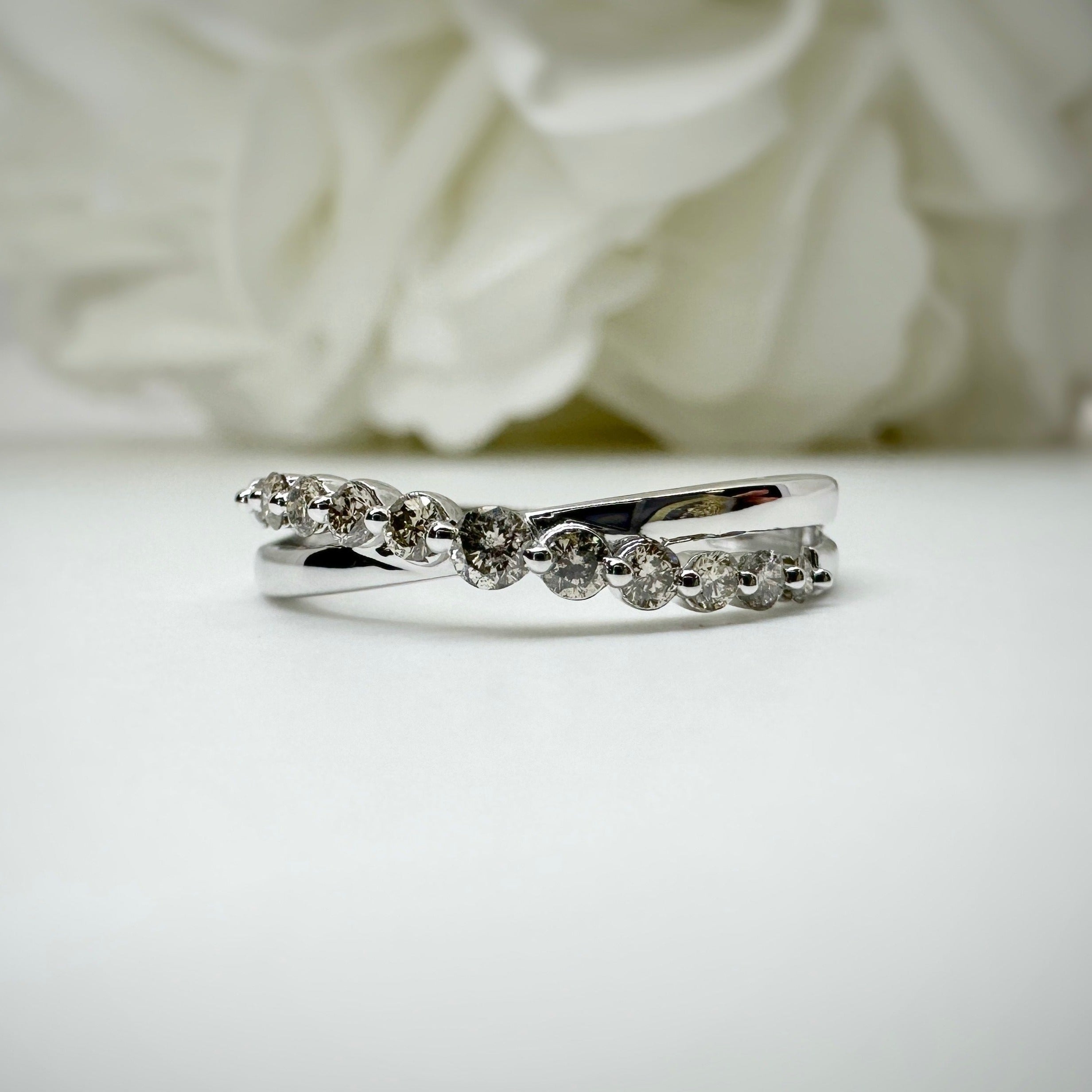 10k white gold cross over natural diamond band