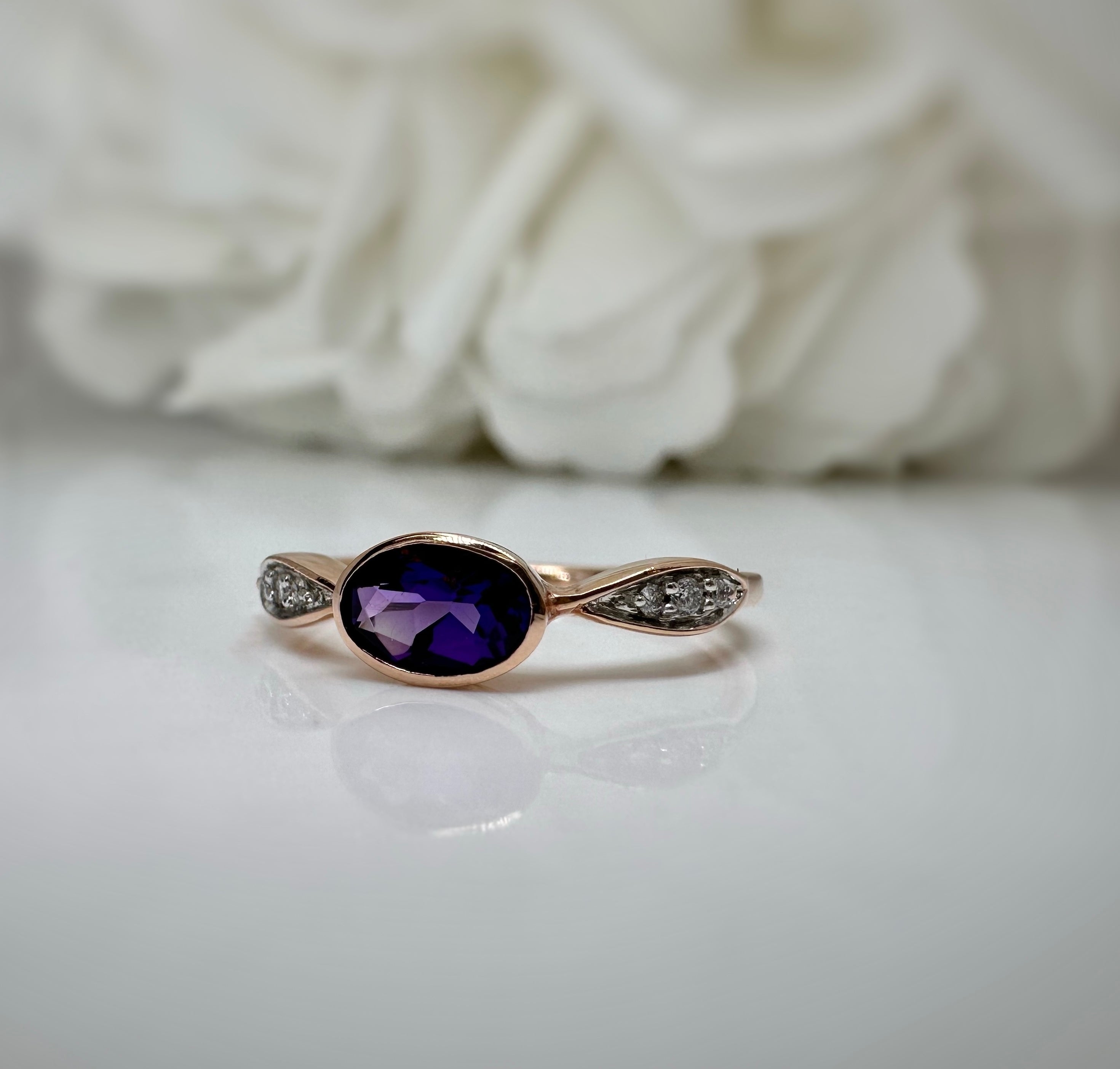 Custom rose gold amethyst and diamond ring