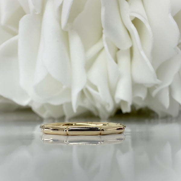 Custom gold ring in a bamboo style
