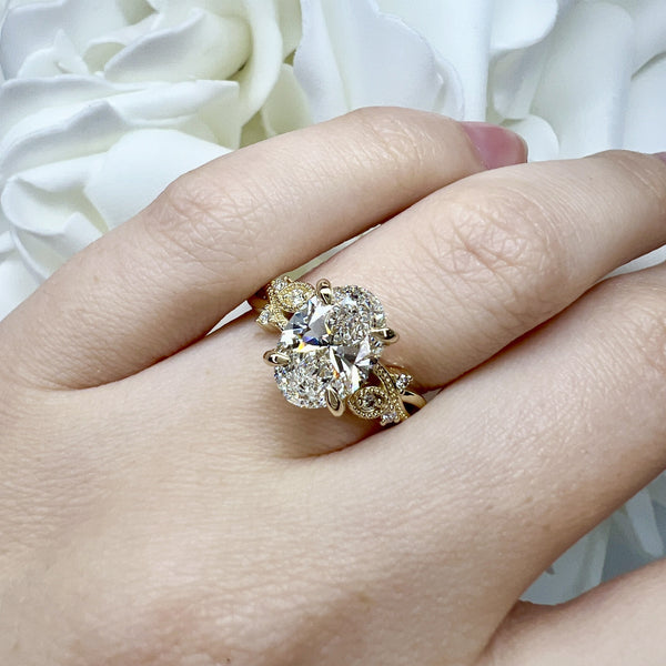 Floral yellow gold engagement ring 
