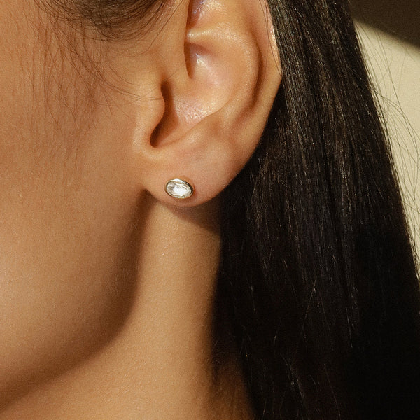 Leah Alexandra Bezel Oval White Topaz Studs | Gold Plated