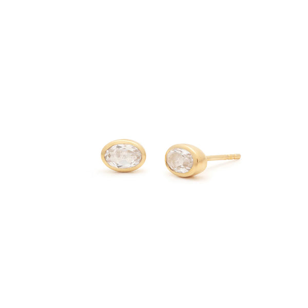 Leah Alexandra Bezel Oval White Topaz Studs | Gold Plated