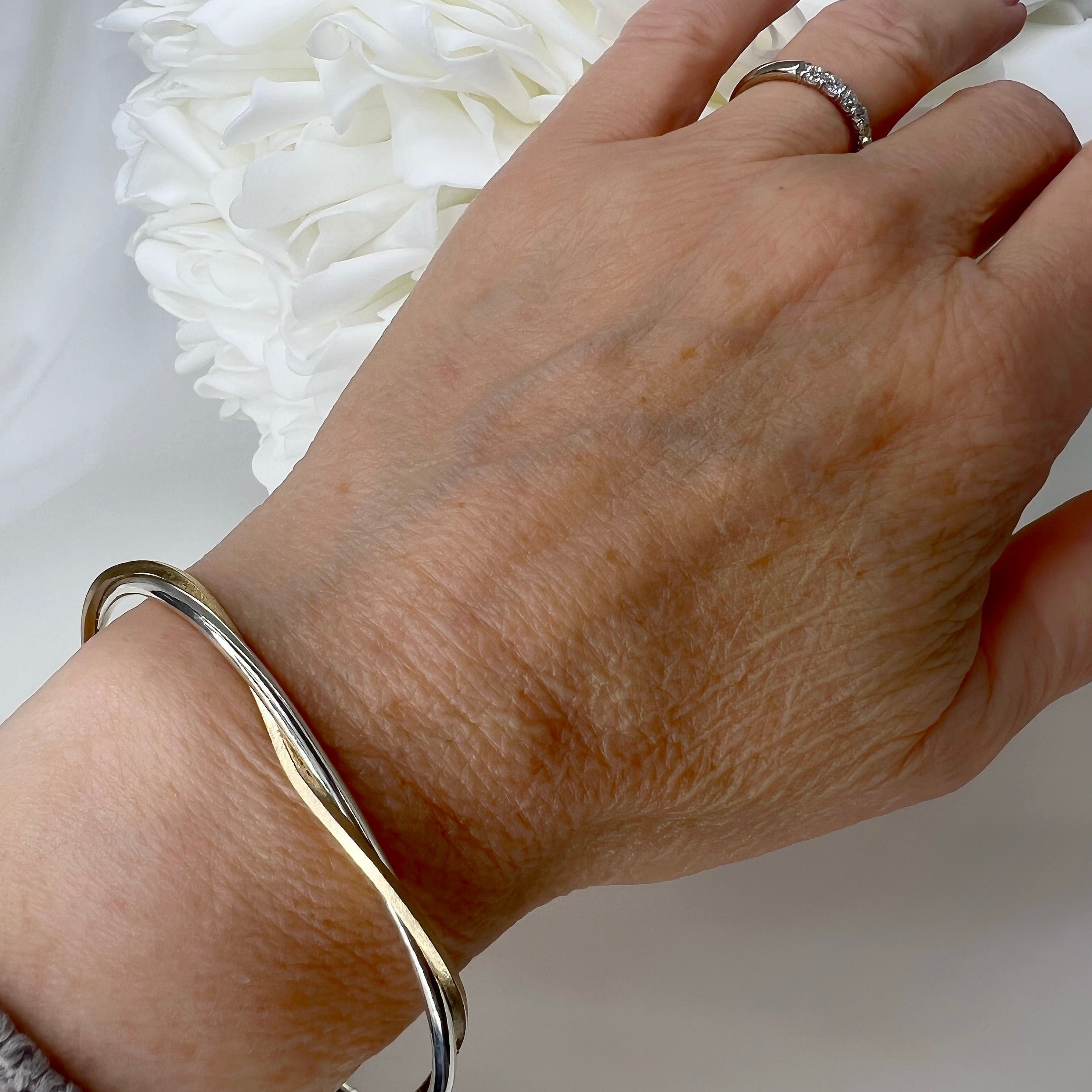 Custom cuff in sterling silver and 10ky
