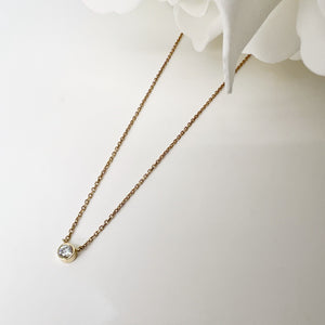 1/10 ct bezel set round brilliant cut diamond necklace