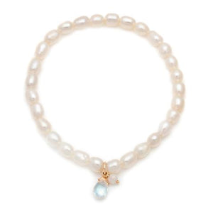 Our classic stretchy Social bracelet's little sister, offered in pearl with moonstone charms.

- 4mm Pearl beads

- Gold filled metal detail